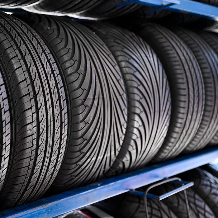 Close up new tyres on shelve in tire shop