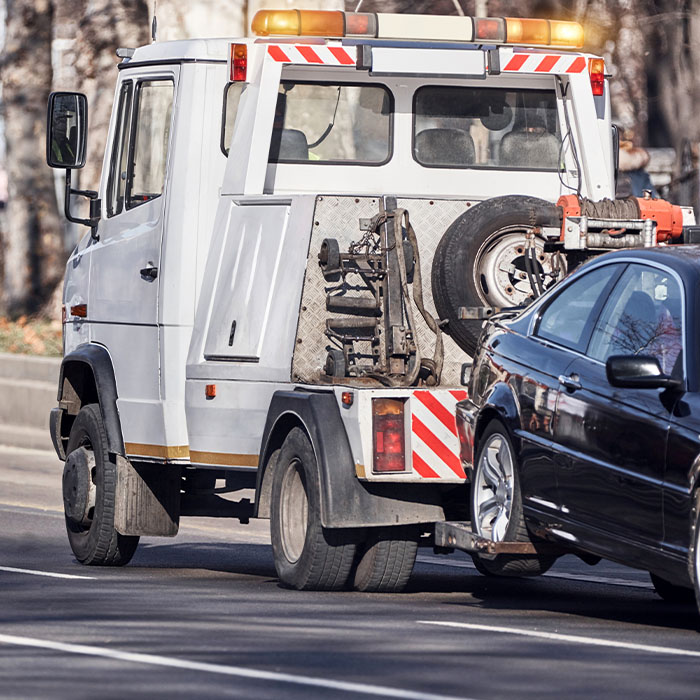 Tow truck carrying vehicle
