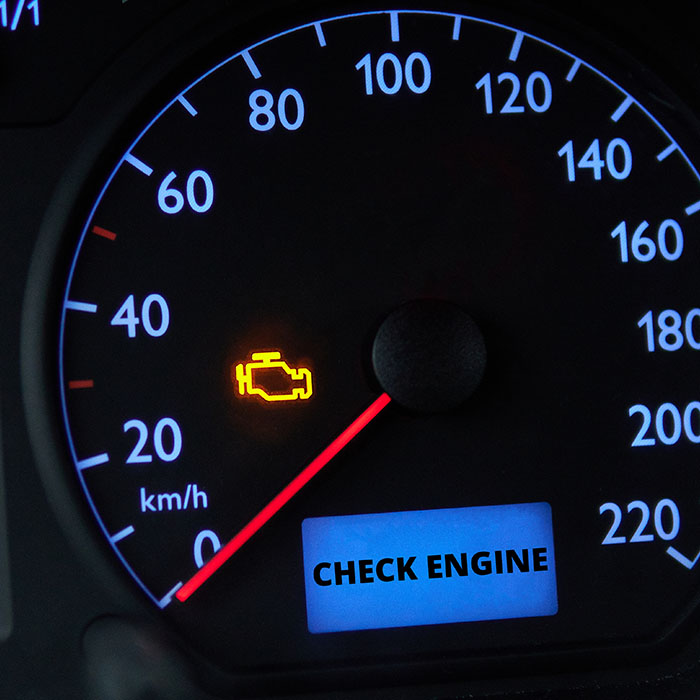 Check engine error light illuminated on car dashboard